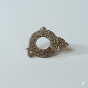Lot 014 A CELADON AND CALCIFIED JADE 'DRAGON' BI-DISC (CHU KUO BI)
STYLE OF HAN DYNASTY