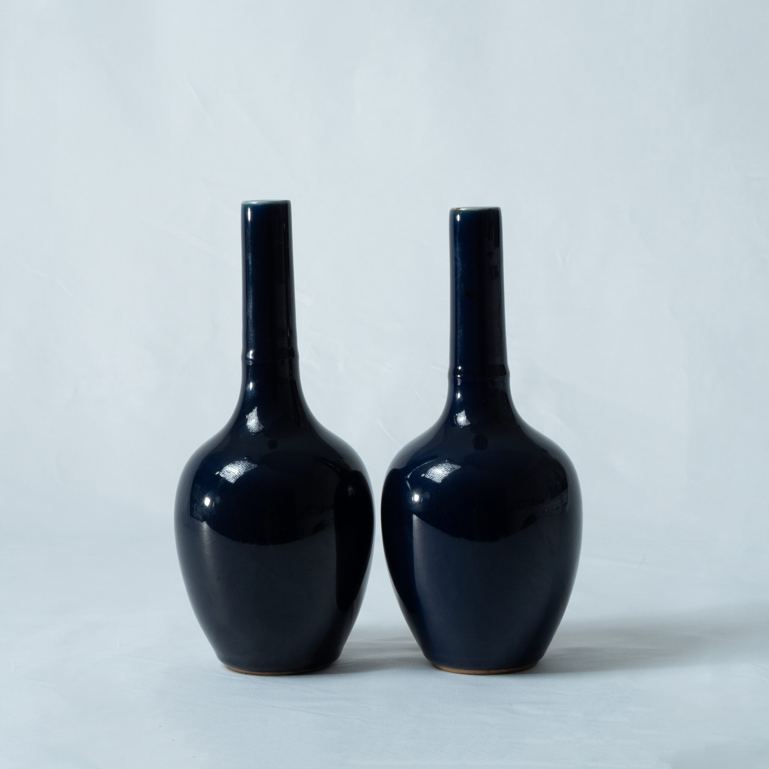 Lot 023 A PAIR OF MAGNIFICENT SACRIFICIAL BLUE GLAZED LONG-NECK VASES
MARK AND PERIOD OF KANGXI