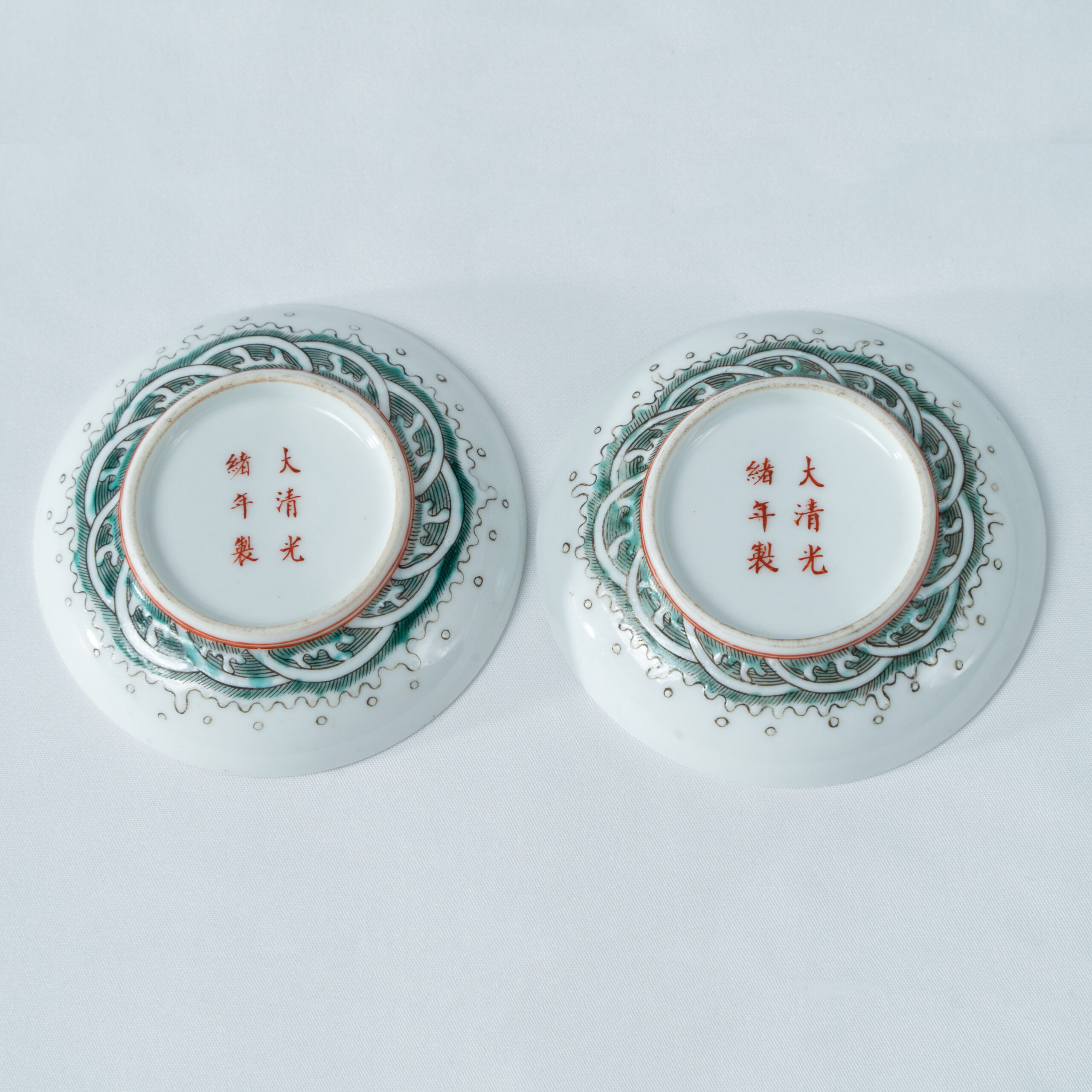 Lot 027 A PAIR OF IRON-RED AND MULTI-COLOR 'FISH LEAPING OVER THE DRAGON GATE' SAUCERS
GUANGXU PERIOD, QING DYNASTY - Image 2