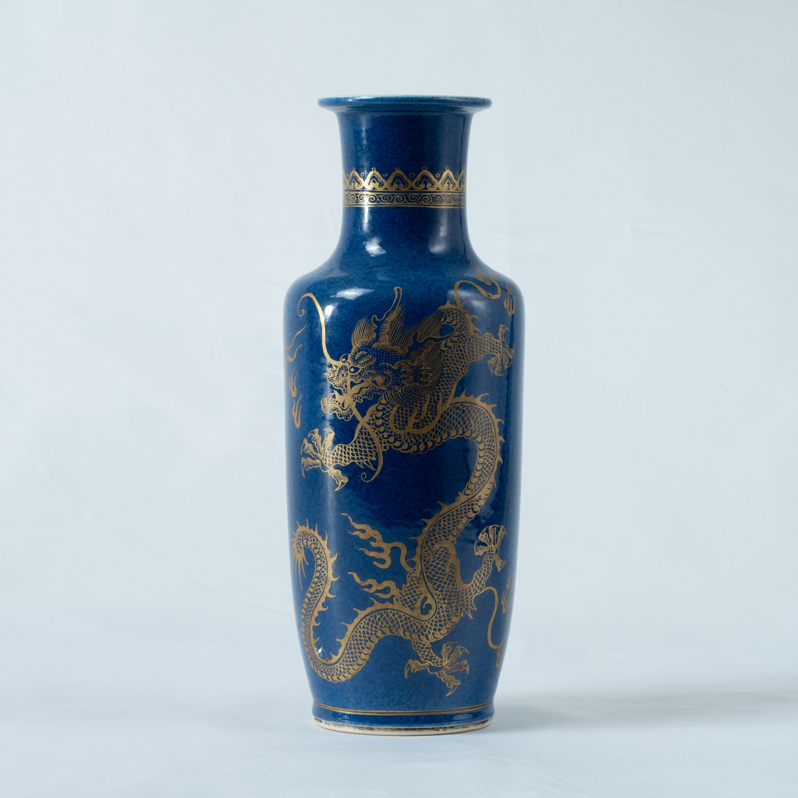 Lot 033 A POWDER-BLUE GLAZED AND GILT-DECORATED 'DRAGON' CLUB-SHAPED VASE
QING DYNASTY