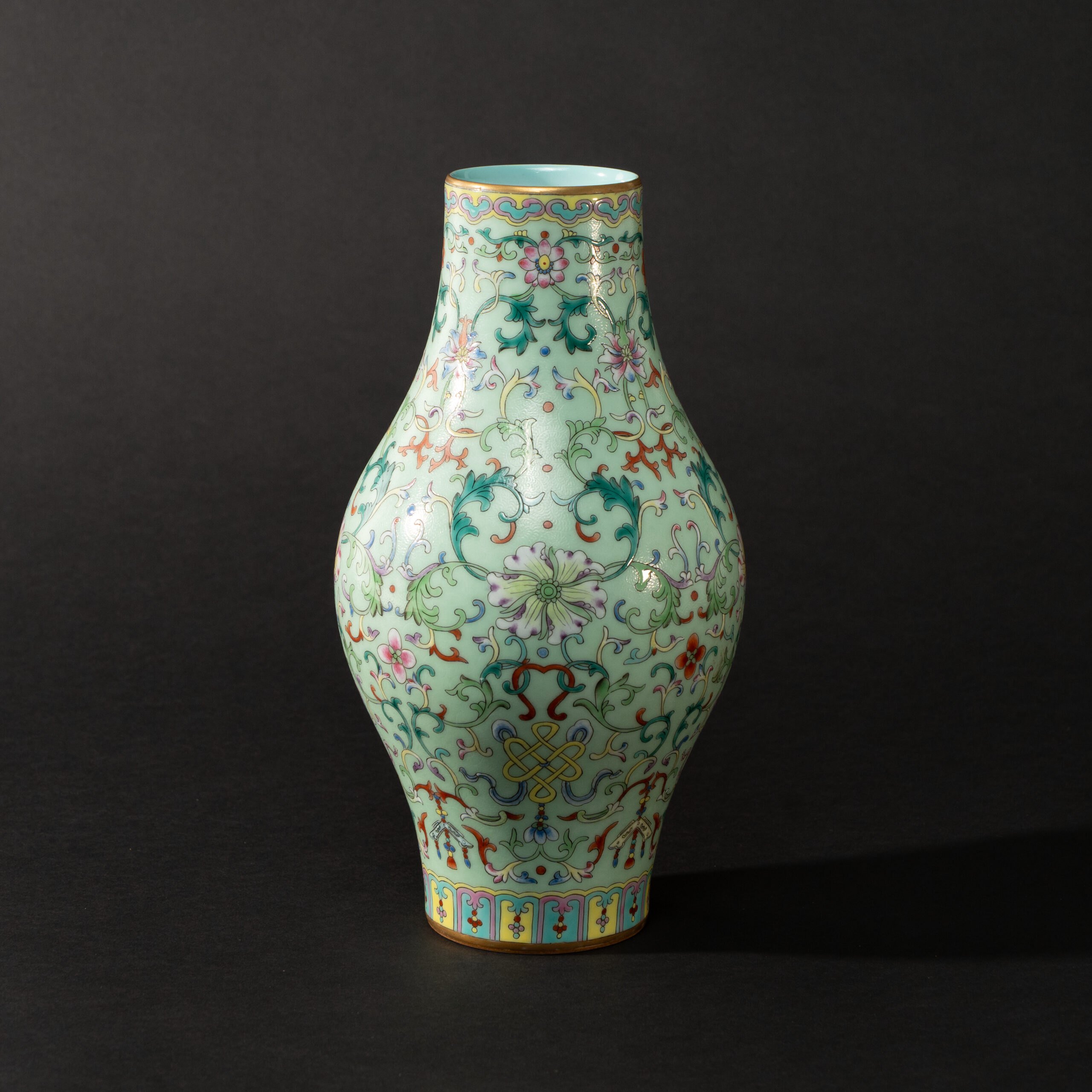 Lot 036 A LIME-GREEN GROUND FAMILLE-ROSE 'LOTUS' OLIVE-SHAPED VASE
20TH CENTURY, QIANLONG MARK - Image 2