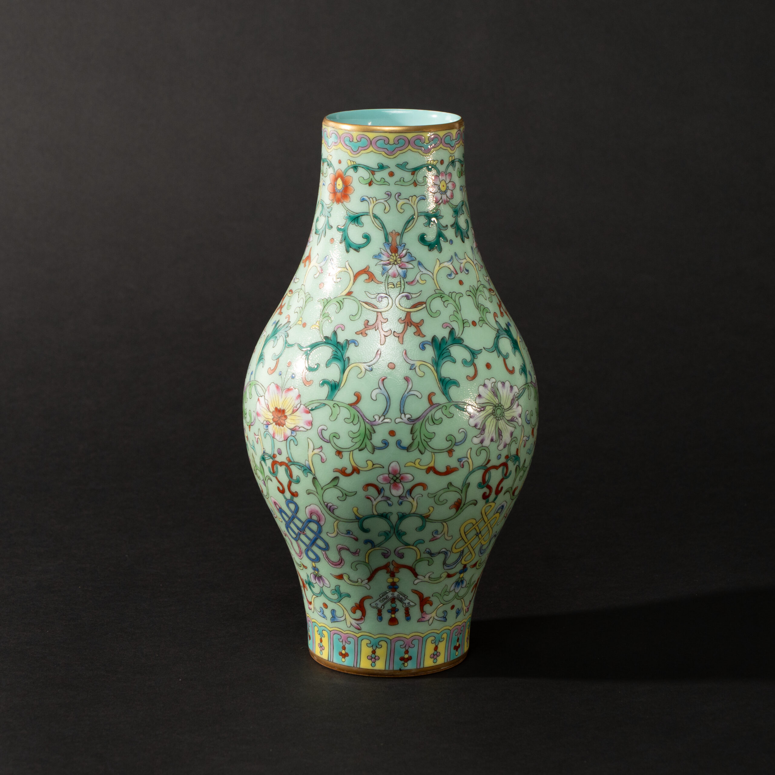 Lot 036 A LIME-GREEN GROUND FAMILLE-ROSE 'LOTUS' OLIVE-SHAPED VASE
20TH CENTURY, QIANLONG MARK - Image 4