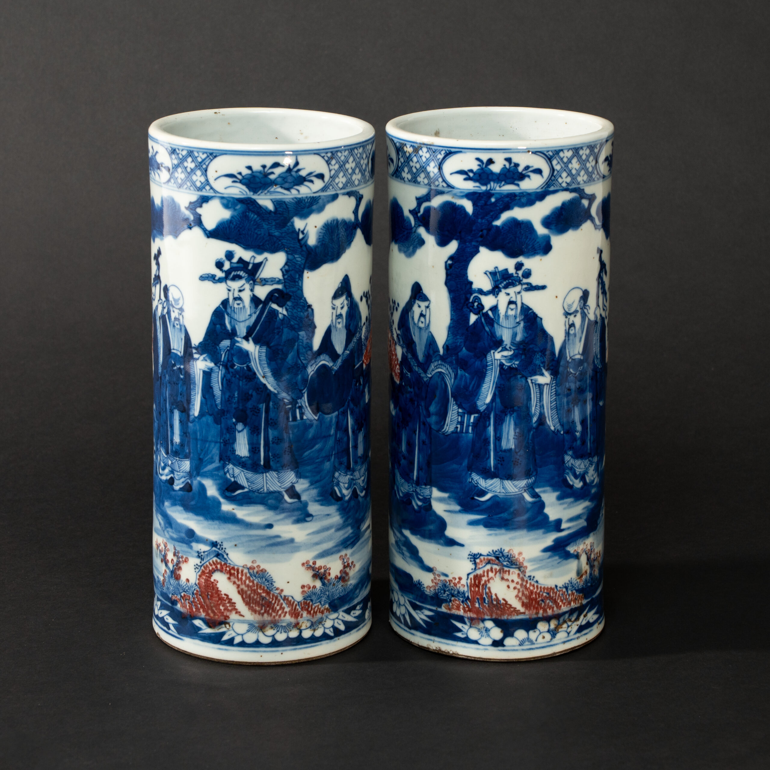 Lot 045 A PAIR OF BLUE AND WHITE AND UNDERGLAZE-RED 'FIGURES' HAT STANDS
LATE QING DYNASTY – REPUBLIC PERIOD