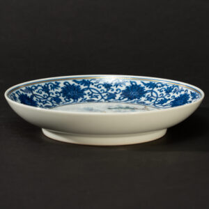 Lot 046 A BLUE AND WHITE AND FAMILLE-ROSE 'BOY AND BUFFALO' DISH
20TH CENTURY, QIANLONG MARK