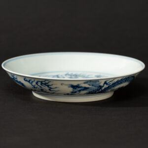 Lot 047 A BLUE AND WHITE 'DRAGON' DISH
20TH CENTURY, GUANGXU MARK