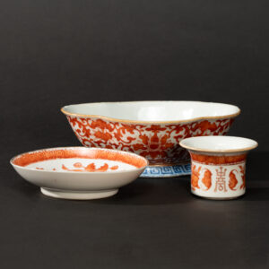 Lot 048 A GROUP OF THREE IRON-RED ENAMEL VESSELS
LATE QING DYNASTY, 19TH CENTURY