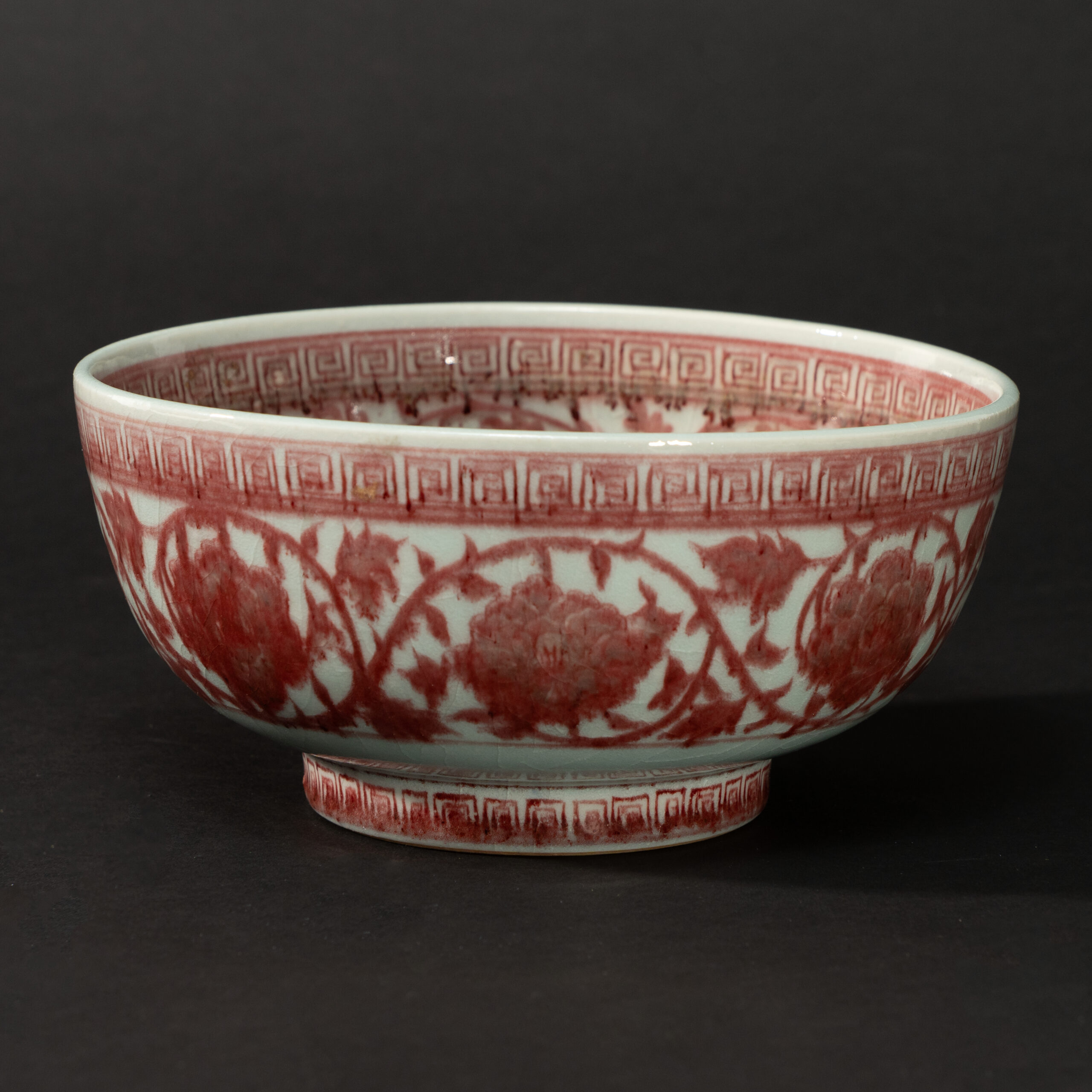 Lot 051 AN UNDERGLAZE-RED 'FLORAL SCROLL' BOWL
MING DYNASTY, 14TH - 15TH CENTURY