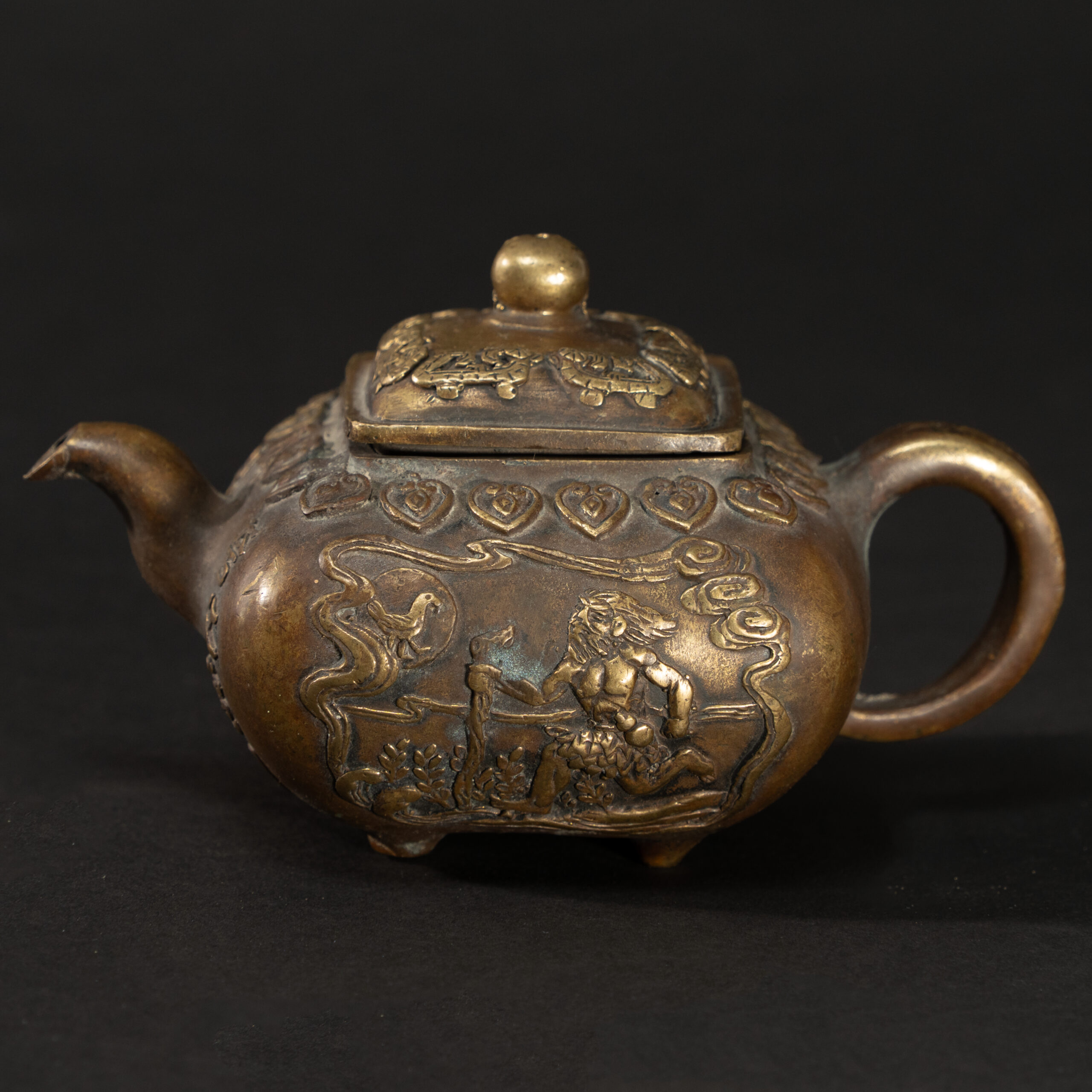 Lot 054 A REPOUSSÉ BRONZE 'MYTHOLOGICAL FIGURES' QUADRANGULAR TEAPOT
LATE QING DYNASTY - REPUBLIC PERIOD - Image 2