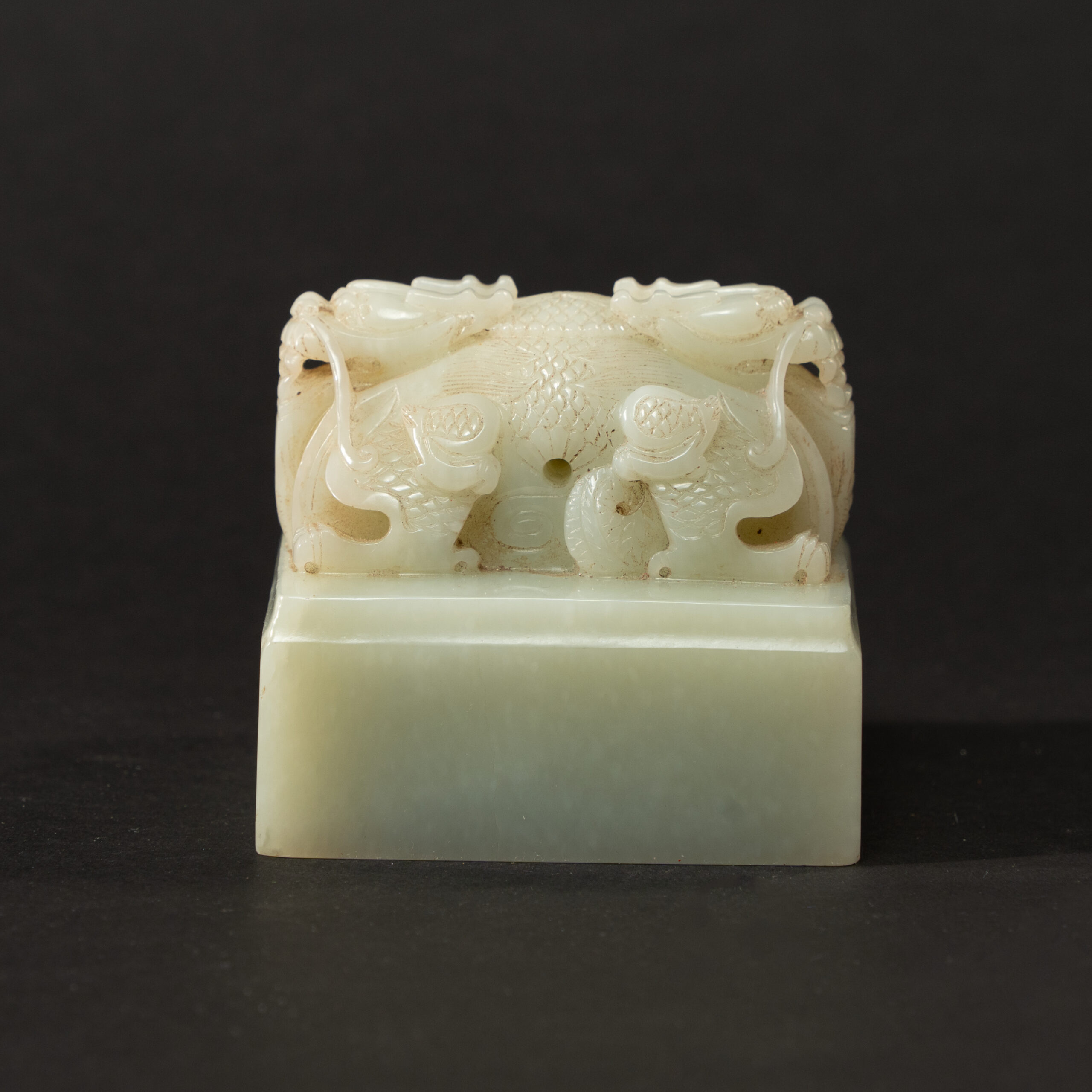 Lot 057 A HIGHLY IMPORTANT IMPERIAL WHITE JADE 'MINGDE ZHI BAO' SEALQIANLONG PERIOD (1736-1795)