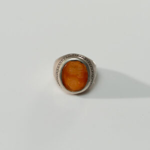 Lot 059 A LARGE AND IMPORTANT BROWN AGATE SEAL RING
INSCRIBED "AHMAD IBN AGHA KHAN"
QAJAR PERSIA OR BRITISH INDIA, CIRCA LATE 19TH CENTURY