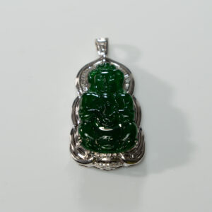 Lot 065 AN IMPRESSIVE VIVID GREEN JADEITE 'GUANYIN' PENDANT WITH DIAMONDS
20TH CENTURY