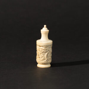 Lot 086 A FINELY CARVED IVORY 'DRAGON AND CLOUDS' SNUFF BOTTLE
REPUBLIC PERIOD