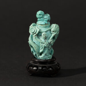 Lot 088 A RARE CARVED TURQUOISE 'FIGURES AND AUSPICIOUS BEASTS' SNUFF BOTTLE
QING DYNASTY