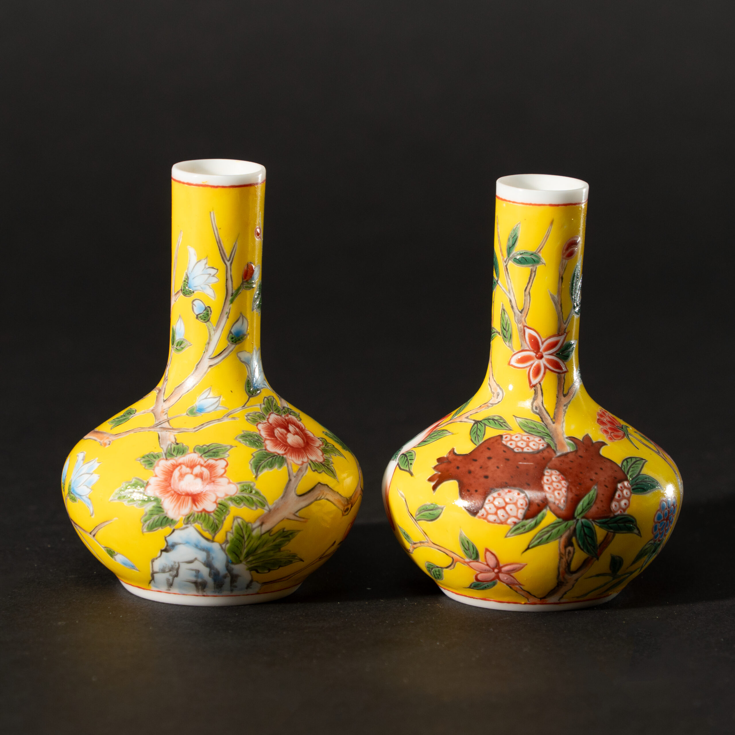 Lot 092 A RARE PAIR OF YELLOW-GROUND PAINTED ENAMEL ON GLASS 'BICI' VASES
20TH CENTURY, QIANLONG MARK