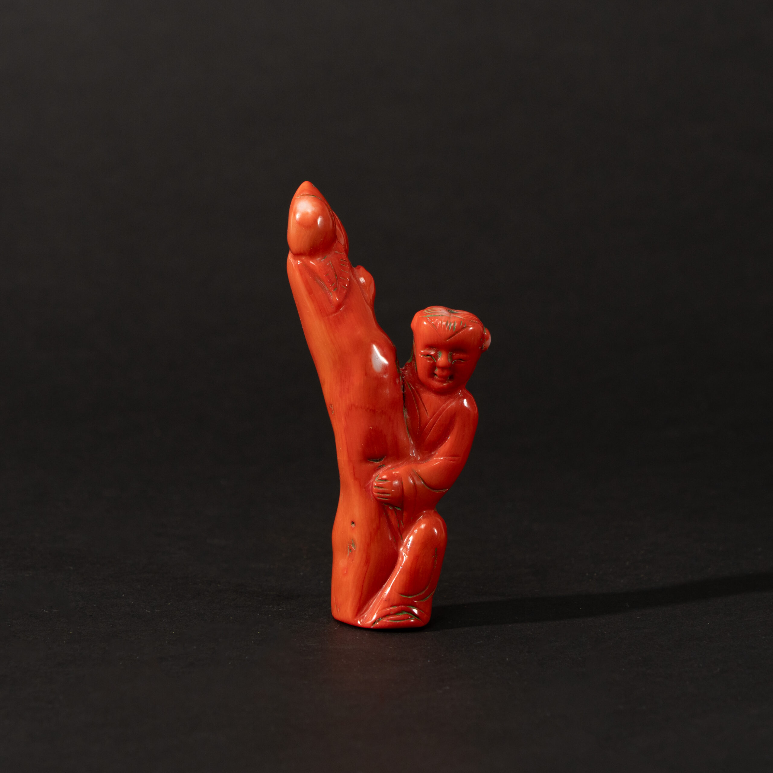 Lot 096 A RARE CARVED CORAL 'IMMORTAL AND LINGZHI' GROUP
QING DYNASTY, 19TH CENTURY