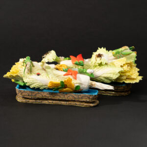 Lot 097 A FINE AND RARE PAIR OF BONE-CARVED AND POLYCHROME 'CABBAGE AND INSECTS' ORNAMENTS
20TH CENTURY