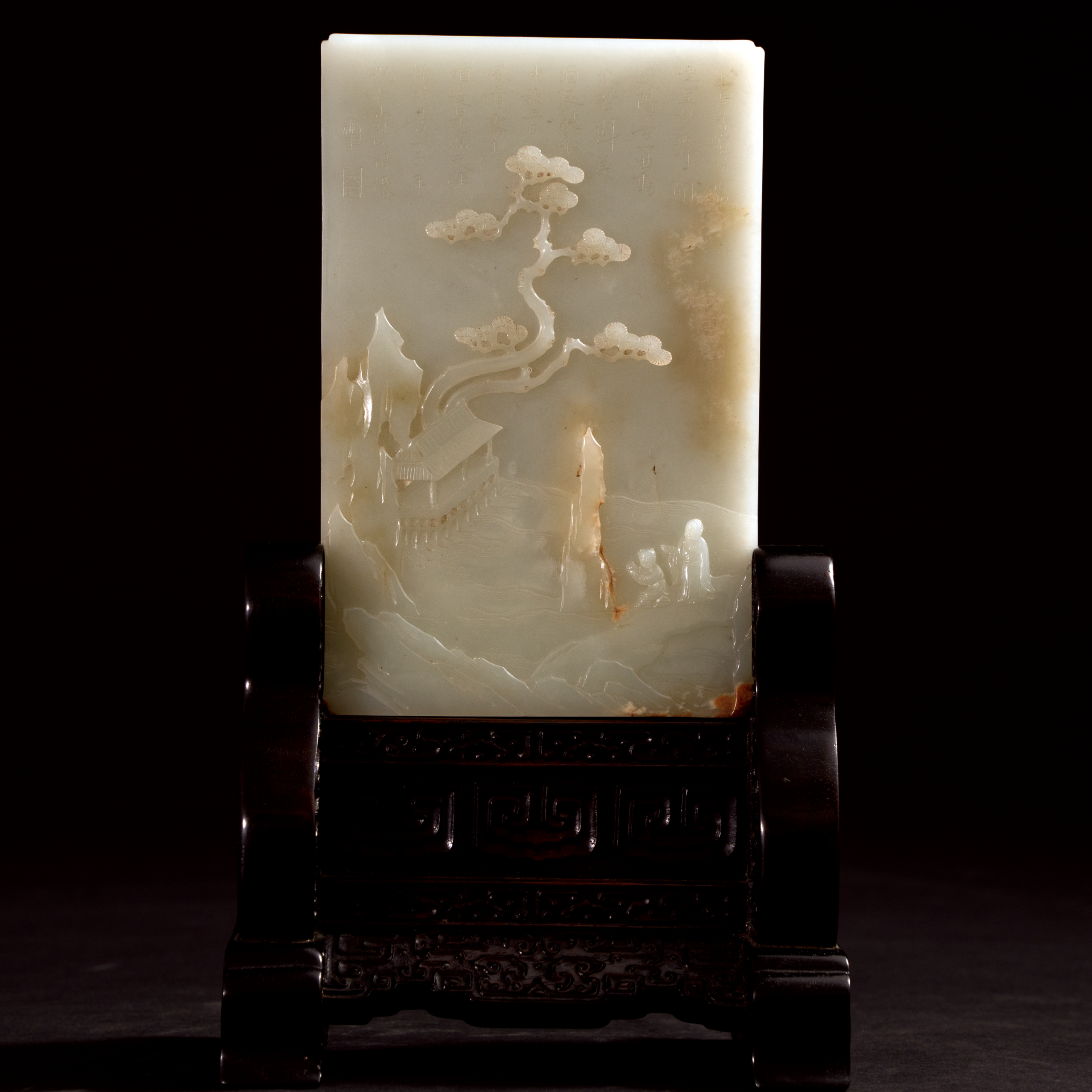 Lot 054 A RARE WHITE JADE 'LANDSCAPE AND POEM' TABLE SCREEN
QING DYNASTY, 18TH - 19TH CENTURY
清代 白玉带皮雕山水人物诗文插屏 - Image 2