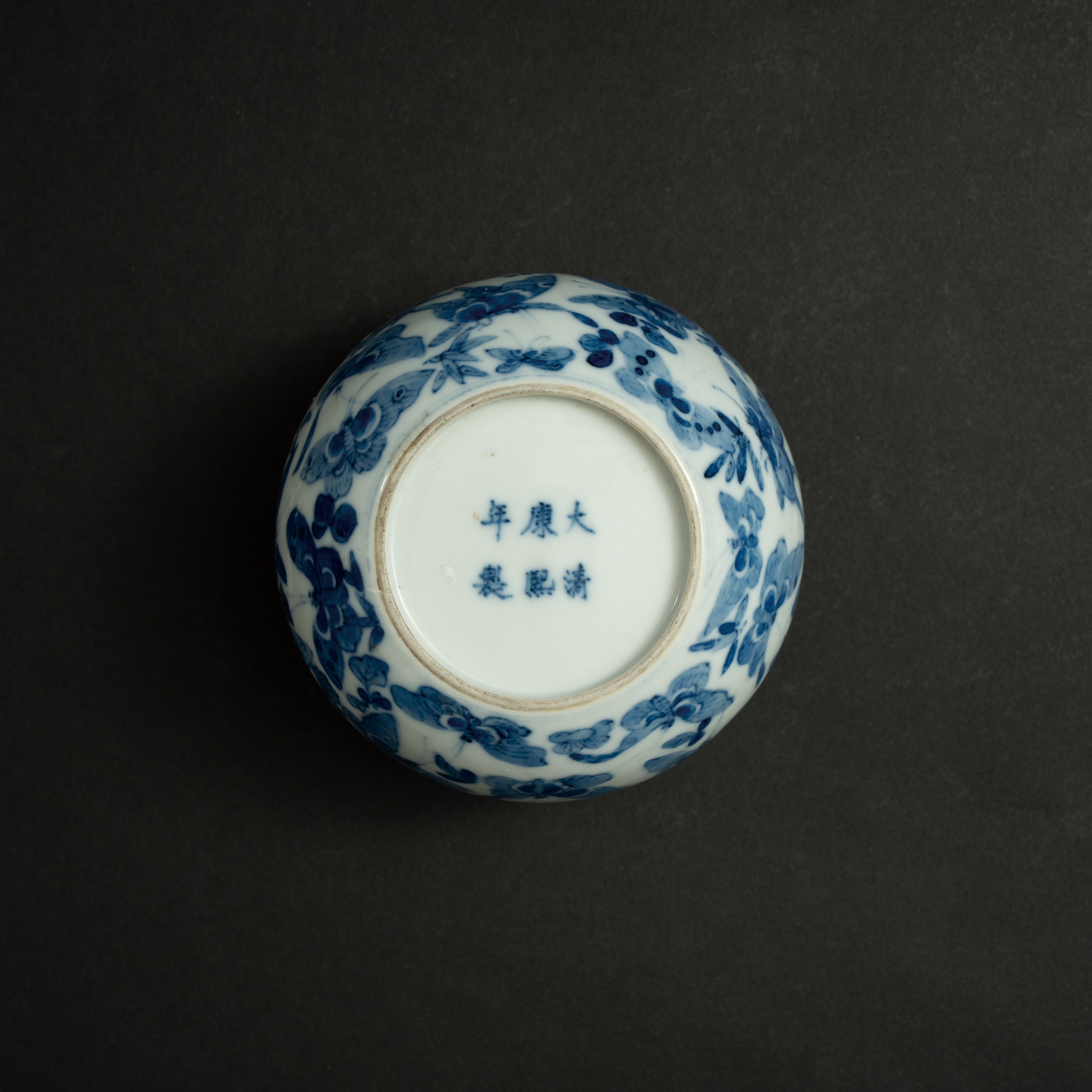 Lot 100 A BLUE AND WHITE 'BUTTERFLIES AND FLOWERS' WATER POT
19TH CENTURY
清19世纪 青花百蝶纹小缸 - Image 3
